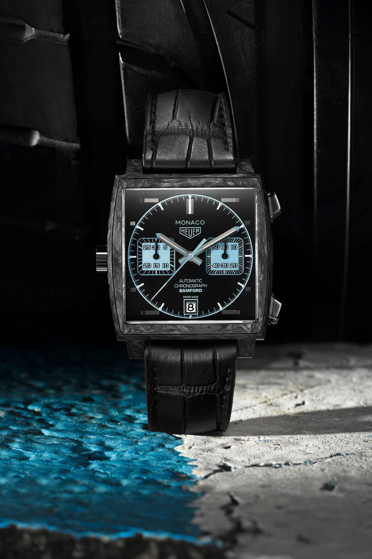 The carbon fiber copy watches have black leather straps.